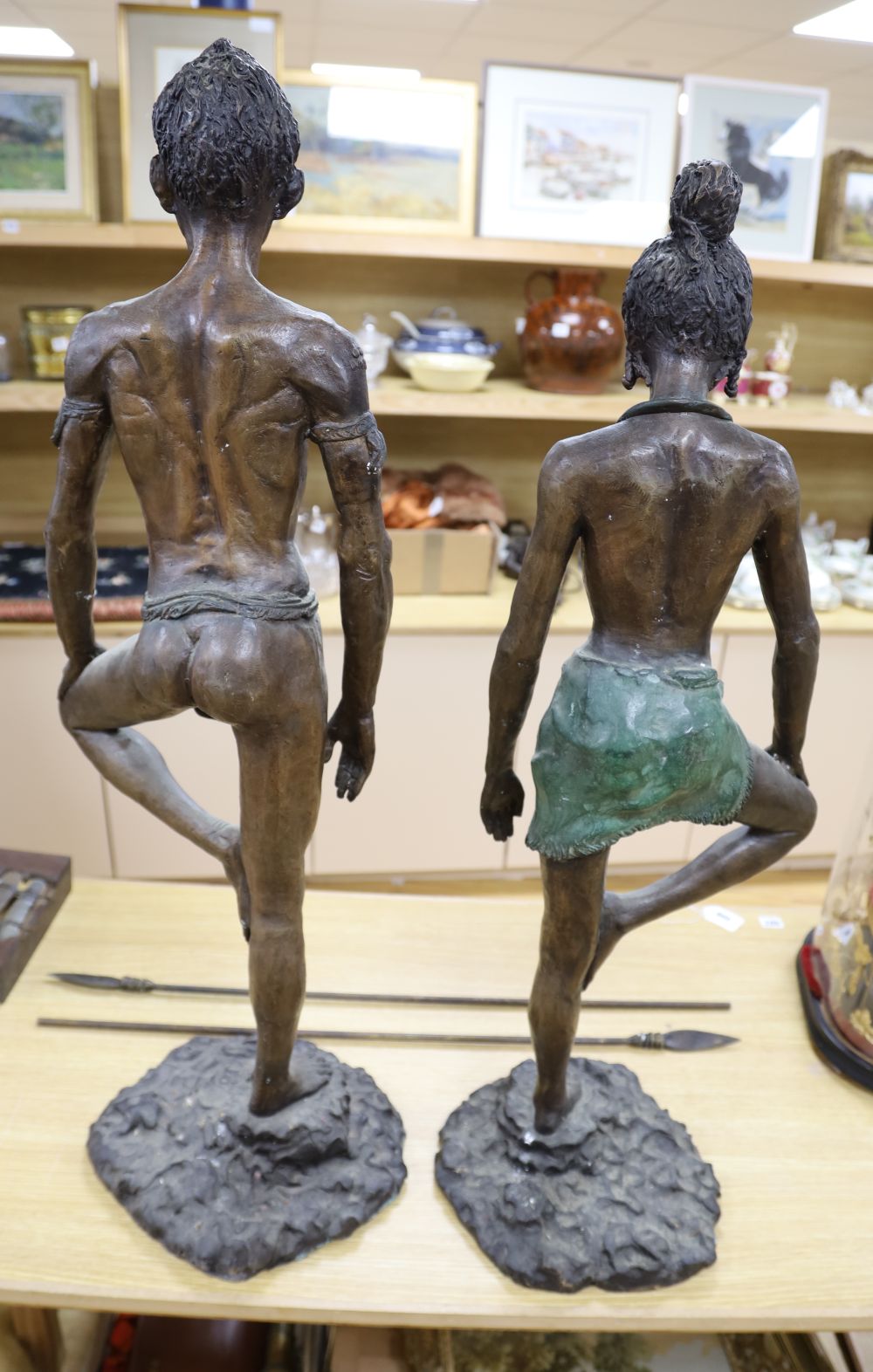 A pair of South African bronze figures, height 95cm